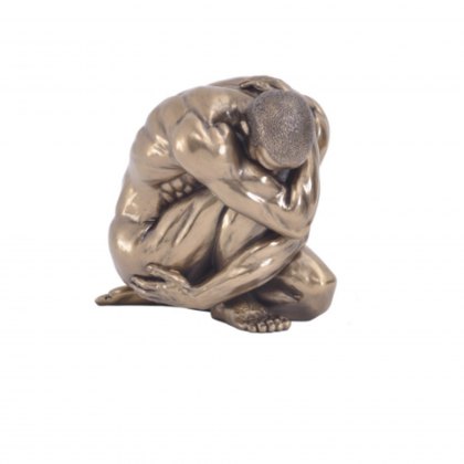 Male Nude Statue Clutching