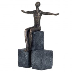 Woman Sculpture Sitting on Blocks in Antique Bronze Finish