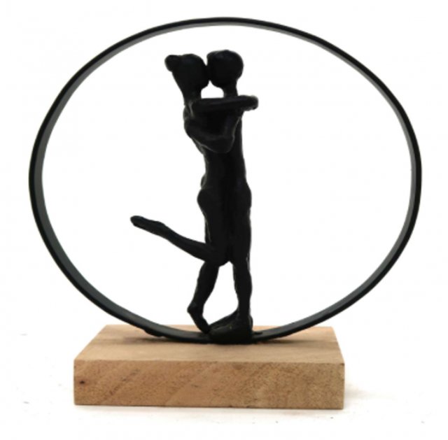 Loving Couple on Wooden Plinth