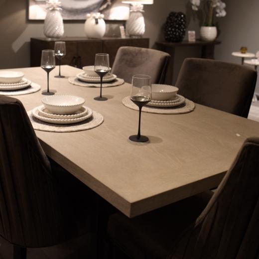 A beautiful oak dining table, ready for everything from morning coffee to dinner with friends.