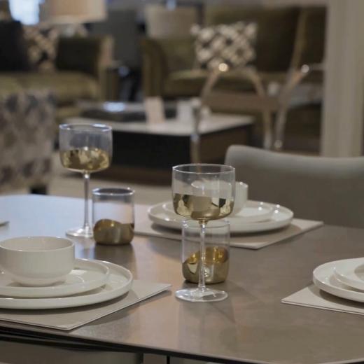 Need a little extra room without sacrificing style? This round dining table extends when you need it,...