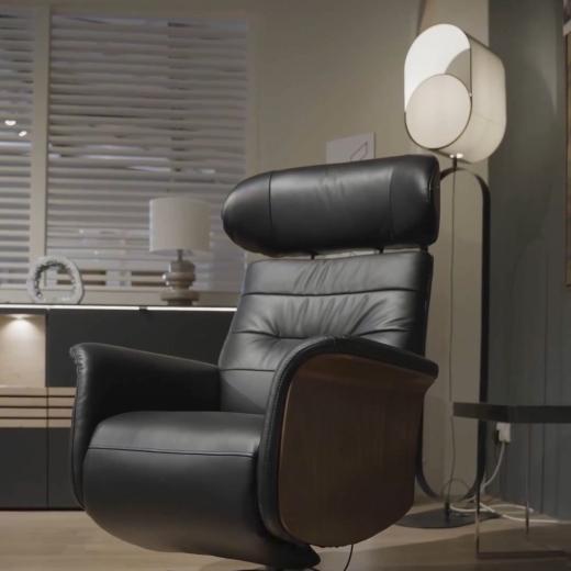 Looking for a recliner that blends comfort with quality? Upholstered in supple black leather, this de...
