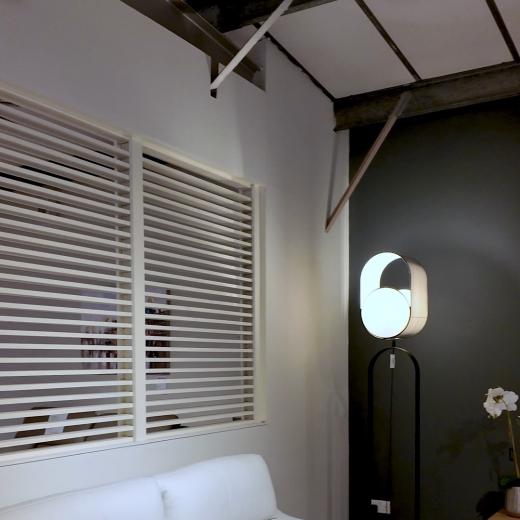 A full living space, brought together through contrast- cream, black, and grey working in perfect bal...